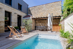 Nous louons pendant nos vacances notre maison située aux Chartrons proche des Qu Bordeaux, France Grande maison de ville confortable avec piscine Entire townhouse vacation rental 659393472656157032
