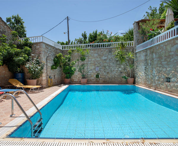 The villa consists of two rooms, one of which is equipped with a double bed and   Villa Aris - Eftapelia Complex Entire villa vacation rental 46789874