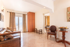 Welcome to our Family Apartment! We are located in St. Prokopios, just footsteps  Family Apartment Sea View Room in hotel vacation rental 26404104