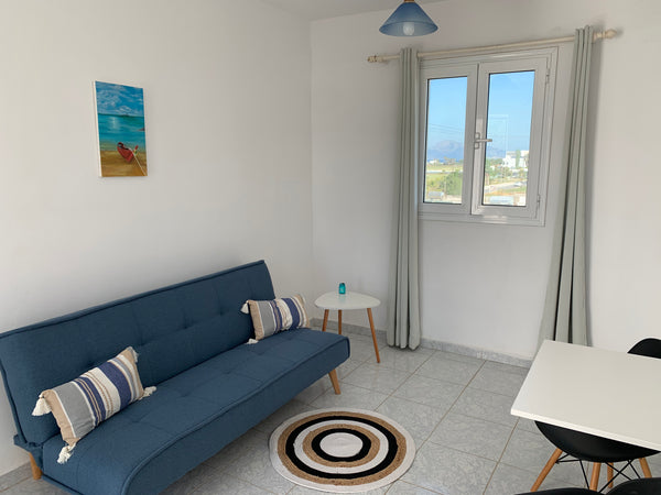 Enjoy some quality time with your loved ones in our family guest house with wond Greece 🌼Spacious apartment with balcony🌼 Entire rental unit vacation rental 44996044