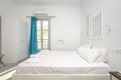 Depis suites& apartments located in a very quiet area in Naxos town at St George  Depis luxury suites naxos triple room Entire serviced apartment vacation rental 43950458