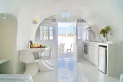 Cally Cave Family suite features bedroom area with queen size bed and bathroom,  Thera, Greece Cally Cave Grand Suite twin shared pool, near Fira Private room in serviced apartment vacation rental 44345208