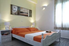 Featuring modern Cycladic décor, this air-conditioned studio opens to a balcony   Ambeli Studio with Garden View Private room in rental unit vacation rental 21625058