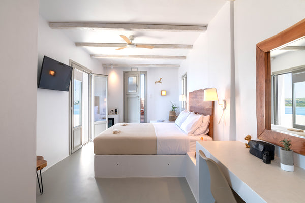 Fully renovated suite located on the first floor and features a private terrace   Paros Comfy - Double Suite Room in bed and breakfast vacation rental 34994772