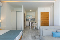 Our Unique and Spacious Studio is located right on the beach road of Rethymno. O Rethimnon, Greece Spacious Renovated Studio|Beach| Sea View Balcony Room in serviced apartment vacation rental 21703533
