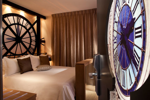 Under the gaze of the monumental station clock, a few, artfully-chosen photograp  Musée d'Orsay Room - Jacuzzi Bathtub Room in hotel vacation rental 24640311