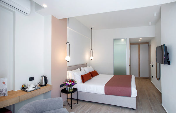 Comfortable & freshly decorated Junior Suite has a private balcony, mosquito net  Junior Suite by The City Hotel & Suites Room in hotel vacation rental 34353884