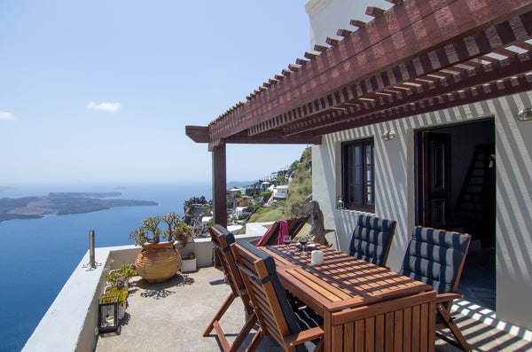 Travel through time by staying at one of the oldest cave houses, build inside th Greece Author's Cave house,breathtaking caldera view!6pr Entire home vacation rental 24503605