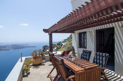 Travel through time by staying at one of the oldest cave houses, build inside th Greece Author's Cave house,breathtaking caldera view!6pr Entire home vacation rental 24503605