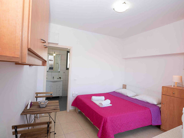 Small and new apartment few steps from sandy beach.Ideal for couples. There is b Greece Small flat with veranda few steps from beach Entire rental unit vacation rental 24551960