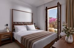 The Damianaki family created Volta Suites & Villas to provide a hospitality expe  One Bedroom Suite with Pool and Garden View Room in boutique hotel vacation rental 711323394678586577