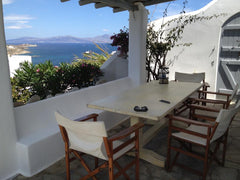 The property is a traditional Cycladic whitewashed house overlooking Οrnos and Κ  Cosy Bohème retreat with sea views Cycladic home vacation rental 36667962