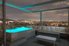 Make your stay in Athens unique. This spacious penthouse with private parking an Athens, Greece Pristine penthouse with Parthenon view by the pool Entire condo vacation rental 569353269833043255
