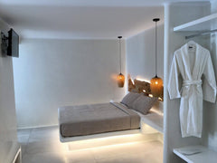 Brand new suites with built-in beds and sofas big wooden mirrors flat screen tv  Mikonos, Greece Brand new suite for 4 with  terrace in front Room in boutique hotel vacation rental 23432619