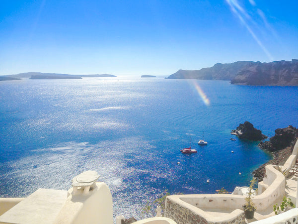 Our house is underneath the two famous blue dome churches. It is a traditional c Thera, Greece Panoramic View Oia Cave House Cycladic home vacation rental 15515430