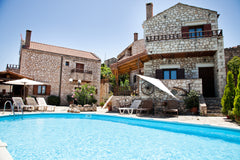 Built of local stone and wood, the family-run Tsivaras Villas are located in Tsi  Tsivaras Villas ( Family - friendly ) Entire villa vacation rental 47869439