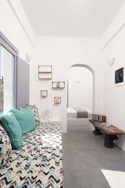 A cosy modern room with the traditional island style that suits the gorgeous isl Greece Blue White Suites 
