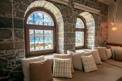 A picturesque seafront apartment in the beautiful village of Plaka. It is locate  'ERONDAS' Stunning Seafront Apartment Entire rental unit vacation rental 13886548