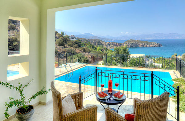 Overlooking the tropical gardens and gazing into the infinity of Aegean Sea, the Agios Nikolaos, Greece Beach front villa Aris Entire villa vacation rental 15477094