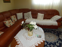 Obývací pokoj, klasicky vybavený ořechovým nábytkem, koženou sedací soupravou s  Šestajovice, Czechia Calm Holiday in Roses dreams Home with a garden Private room in rental unit vacation rental 32579153