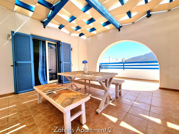 Our bright apartment is situated in Livadia, Tilos, 300m from the beach and 150m Livadia, Greece Zafeiris Apartment 2 Entire condo vacation rental 17933246