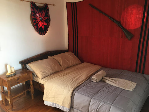 A very comfortable room inside at a small stone village next to a cafe restauran Chania, Greece Koumos Farm stay vacation rental 40727951