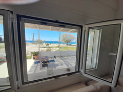 It is a studio apartment within a building on the frontline of the coast. It is   Paximadia - Lovely 1 bedroom apt - beach front Entire rental unit vacation rental 587576429811369530