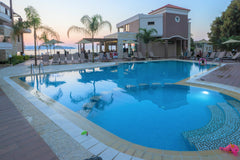 The magnificent view of Agioi Apostoloi bay, the excellent location on the beaut  Golden Bay - Two bedroom Maisonnette Private room in serviced apartment vacation rental 564260185595589930
