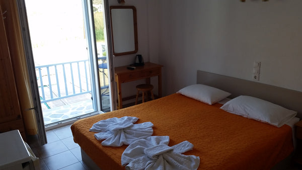 Nos chambres sont situées a 50 metres de la magnifique plage de Kamares. Le port Greece Double room no2, 50 meters from a beautiful beach! Entire rental unit vacation rental 25837160