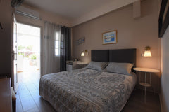 Rodakas Hotel, has 23 rooms with a total capacity of 64 people. <br />We served  Thera, Greece Cozy double room, amazing pool, breakfast included Private room in bed and breakfast vacation rental 2591924