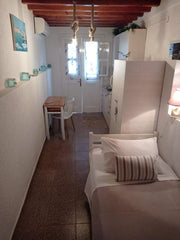 Our property concerns a single-bed,low budget,  room which does not have  Wi-Fi. Mikonos, Greece PAOULAS APARTMENTS II (Strictly for one person) Private room in tiny home vacation rental 26016164