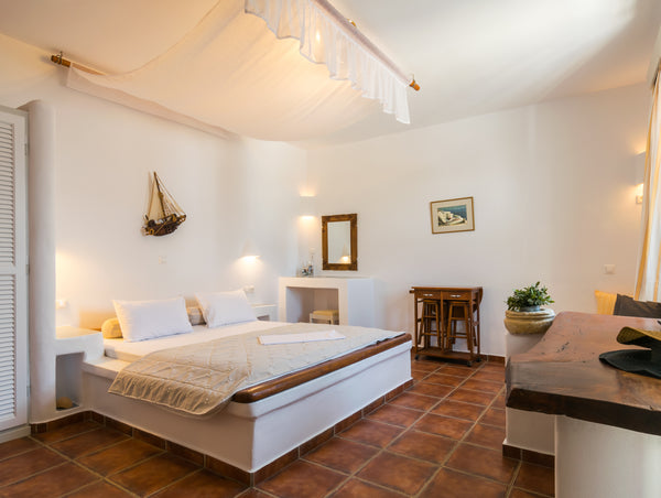The Cycladic-style Giannoulis Hotel is centrally located in the seaside village  Adamantas, Greece Studio on Adamas , Giannoulis Hotel Room in serviced apartment vacation rental 17864909