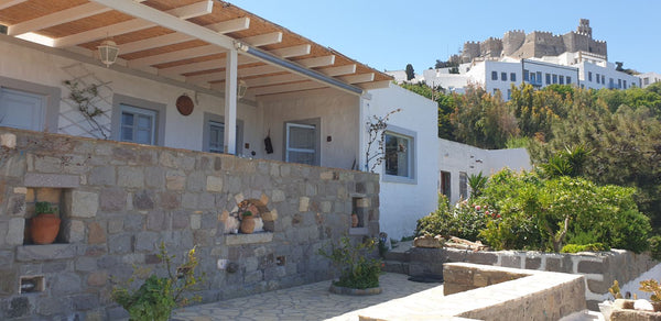 Traditional villa in Chora Patmos built on the tip of the cliff, at an amphithea  Patmos Chora Traditional Villa safety and  health Entire townhouse vacation rental 5724341