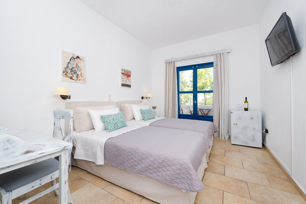 It is a quiet two-bedroom apartment, ideal for families with children, in the Ak Greece Relaxing rooms in Akrotiri santorini & pool RR Room in boutique hotel vacation rental 32649175
