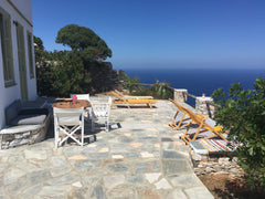 The property consists of a two-bedroom main house and a guest bungalow, each wit Athens, Greece Hillside stone house with sea-view Entire home vacation rental 11314928