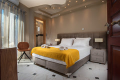 Angelica's Deluxe Rooms elegantly designed with respect for the architecture of  Adamantas, Greece Angelica's "Lux" Room in Adamas Private room in serviced apartment vacation rental 26792285