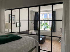 Live like a native Dane from Copenhagen in this chic 1st floor apartment. Quiet  Copenhagen, Denmark Classic Vesterbro apartment with balcony Entire condo vacation rental 52434059
