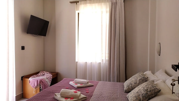 The apartments belong to Varouxakis family, who are famous for their kindness an  Vaso Apartments Private room in rental unit vacation rental 44364848