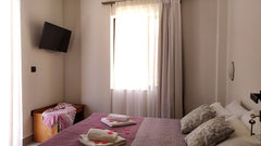 The apartments belong to Varouxakis family, who are famous for their kindness an  Vaso Apartments Private room in rental unit vacation rental 44364848