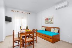 Take advantage of the blue flagged beach of Chrisi Akti that is just 100 meters  Chania, Greece Pool view apartment near local beach & Chania Entire serviced apartment vacation rental 34859038