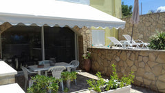 The apartment is part of a two storey "Villa Fotini" with pool and is located in  Semi-basement apartment in Dramia Entire rental unit vacation rental 18015446