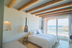 Unique architectural features including an arched doorway complete this room’s d  The Theodore Boutique Hotel - Revelation Room in boutique hotel vacation rental 566278161817447983