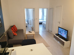 Fully renovated- Architect designed 2 bedroom apartment 10 minutes walk from "La  Renovated 2 bedroom design apartment at center. Entire serviced apartment vacation rental 665679128178055794