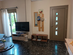 Ground floor apartment by to the sea, located in the city. There  are restaurant  Ισόγειο διαμέρισμα με αυλή, δίπλα στην θάλασσα Entire condo vacation rental 677422372330998118