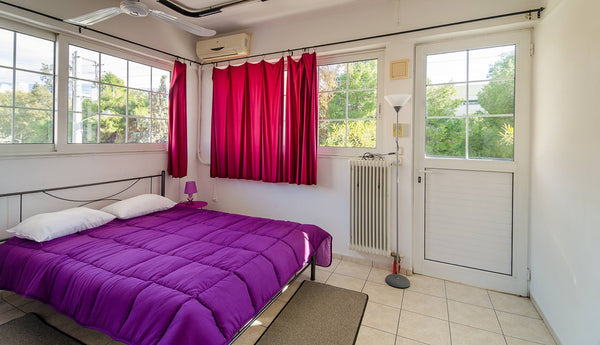 A sunny newly furnished air conditioned  room with a double bed and balcony very Athens, Greece BLUE SKY room with shared bathroom and kitchen. Private room in rental unit vacation rental 17432433