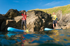 Paddleboarding Around Newquay's Coastline  Private Tours and Travel Guide Europe London CITY Newquay Destination Tour Europe London CITY Newquay