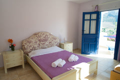 This one bedroom apartment, with living room, kitchen and bathroom, opens to a b Aegiale, Greece Amorgos, One Bedroom Apartment Entire rental unit vacation rental 4029220