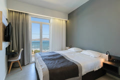 Overlooking Stalos Bay, our small family hotel enjoys panoramic views of the isl Chania, Greece Twin Room Sea View Room in boutique hotel vacation rental 40496895