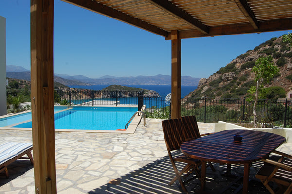 The villa in blue colours is overlooking the tropical bay garden, faced to the s Agios Nikolaos, Greece Blue seaview villa Ourano with pool Entire villa vacation rental 12510213