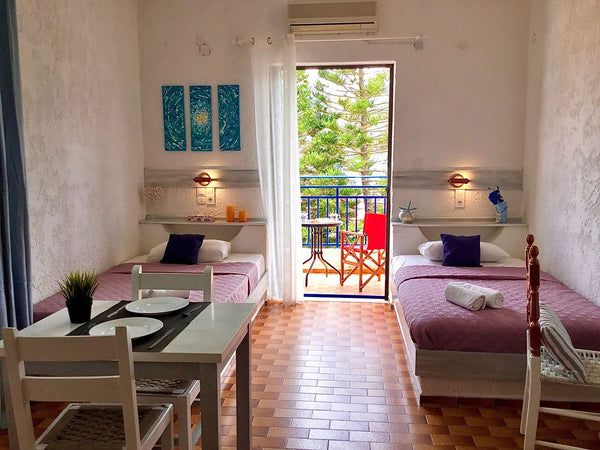 This property is 1 minute walk from the beach.<br />The apartments are right by  Heraklion, Greece Cozy room in Agia Pelagia with garden view Private room in rental unit vacation rental 617952768672833949